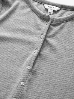 - Geribbelde Henley-bodysuit met lange mouwen*Next Hot