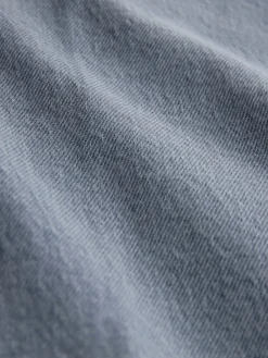 - Jeans met wijde pijpen en opgestikte zakken*Next Hot