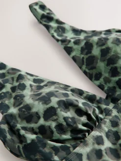 - Diepuitgesneden buikcorrigerende tankinitop*Next Clearance