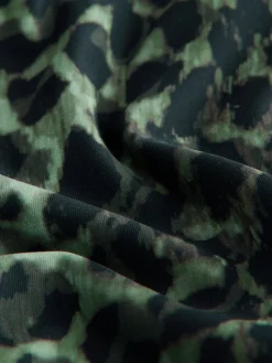 - Diepuitgesneden buikcorrigerende tankinitop*Next Clearance