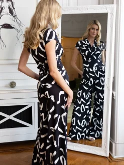 HotSquash zwarte jersey jumpsuit met wijduitlopende pijpen*Hot Squash Outlet