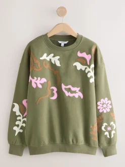 - Sweatshirt with Appliqué Details*Next