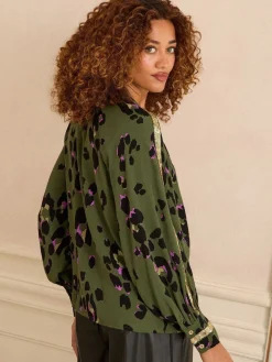 - blouse met ronde hals, lange mouwen en paillettenrand*Love & Roses Outlet