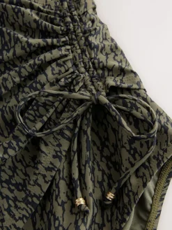 Kakigroen/zwart - Badpak met vormgevende zijrimpeling en buikcorrectie*Next Discount