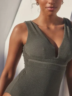 Khaki groen met glitters - Diepuitgesneden vormgevend buikcorrigerend badpak*Next Best