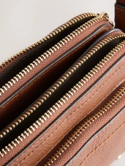 - Crossbodytas met dubbele rits*Next Best