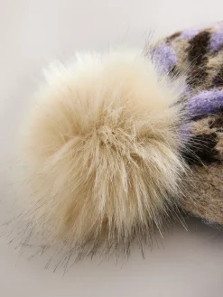 - Gebreide muts met pompon*Next Best