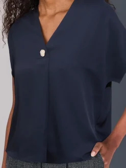 - Blouse met V-hals en korte mouwen*Next Online