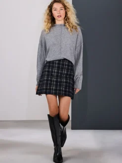 - Geborstelde minirok*Next Outlet