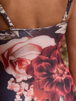 Marineblauw met bloemenprint - Vormgevend bandeaubadpak met buikcorrectie*Next Hot