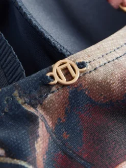 Marineblauw met bloemenprint - Vormgevend bandeaubadpak met buikcorrectie*Next Hot