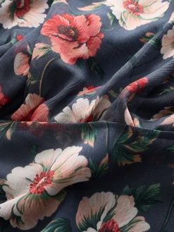 - Gedrukte Maxi-jurk met hoge hals en tierlantijntjes*Next Online