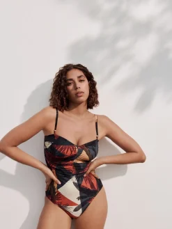 Marineblauw/oranje met palmprint - Vormgevend bandeaubadpak met buikcorrectie*Next Hot