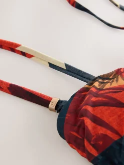 Marineblauw/oranje met palmprint - Vormgevend bandeaubadpak met buikcorrectie*Next Hot