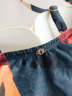 Marineblauw/oranje met palmprint - Vormgevend bandeaubadpak met buikcorrectie*Next Hot