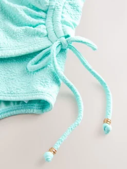 Mintgroen, textuur - Badpak met vormgevende zijrimpeling en buikcorrectie*Next Clearance