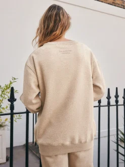 - Essentials sweatshirt met relaxte pasvorm, lange snit en zakken*Next Online
