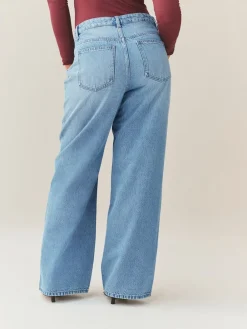 Normaal blauw - Jeans met zandloperpasvorm en wijde pijpen*Next Outlet