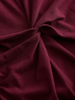 - Zomerse T-shirtjurk met draai en korte mouwen*Next