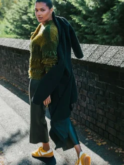 - Cropped broek van imitatieleer met wijde pijpen*Roman Best