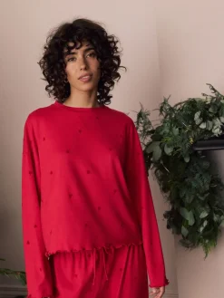 - Zachte pyjama met lange mouwen en hartjesprint*Next New