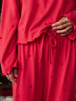 - Zachte pyjama met lange mouwen en hartjesprint*Next New