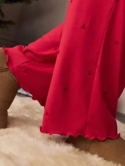 - Zachte pyjama met lange mouwen en hartjesprint*Next New