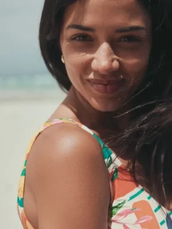 Rood/groen tropisch - Buikcorrigerend DD+ badpak met beugels en ronde hals*Next Clearance