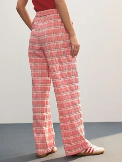 - Broek met wijde pijpen*Next