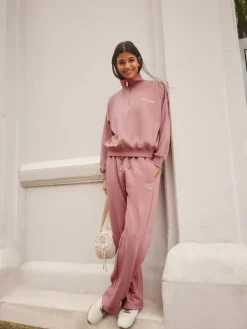 - Sweatshirt met korte rits*self.