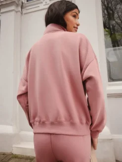 - Sweatshirt met korte rits*self.