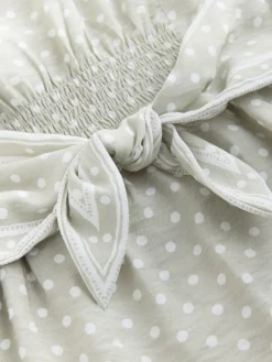 - Mini-jurk met strikceintuur*Next