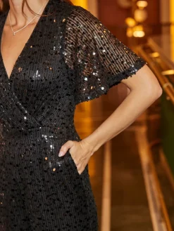 - Jumpsuit met engelmouwen en lovertjes*Sosandar Outlet