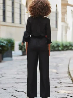 jumpsuit met zijStrepen en knoopsluiting aan de voorkant*Sosandar Sale
