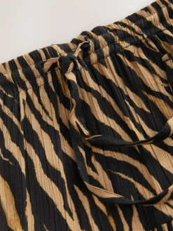 - Maxirok met getailleerde taille*Next Online