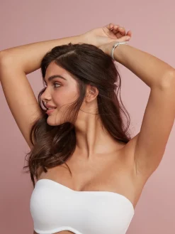 - Minimaliserende strapless bandeaubeha zonder vulling in cupmaat DD+*Next Online