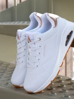 - goudkleurige damessneakers met standaard pasvorm Uno*Skechers Hot