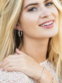 - Copenhagen oorringen met edelmetaal en kristallen*Ivory & Co Hot