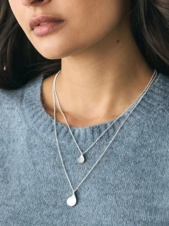 - Gelaagde ketting met glinsterende blaadjes*Next