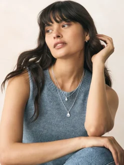 - Gelaagde ketting met glinsterende blaadjes*Next