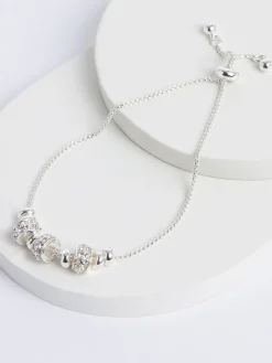 - Glinsterende trekarmband met popcornkralen*Next Best