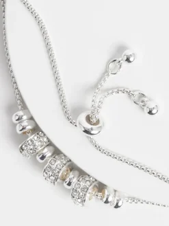 - Glinsterende trekarmband met popcornkralen*Next Best