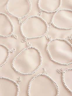 Zilverkleurig - Letterarmband met stretch*Next Outlet