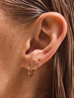 - Stainless Steel Graduated Huggie Hoop Earrings 3 Pack*Next Clearance