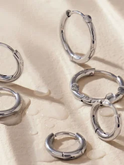 - Stainless Steel Graduated Huggie Hoop Earrings 3 Pack*Next Clearance