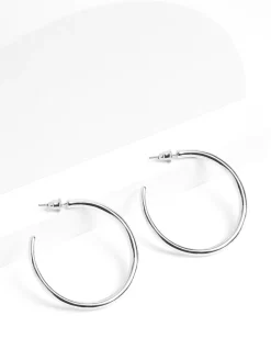 - Tap toelopende oorringen*Next Online