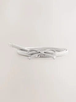 - Smalle stretchriem*Next