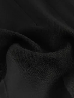 - Corrigerende broek met grote zakken*Next Online