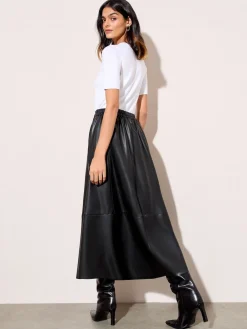 - Faux Leather Midi Skirt*Friends Like These Best