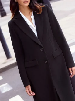 - modieus gesneden maxi-lange jas met enkele knoopsluiting*Friends Like These